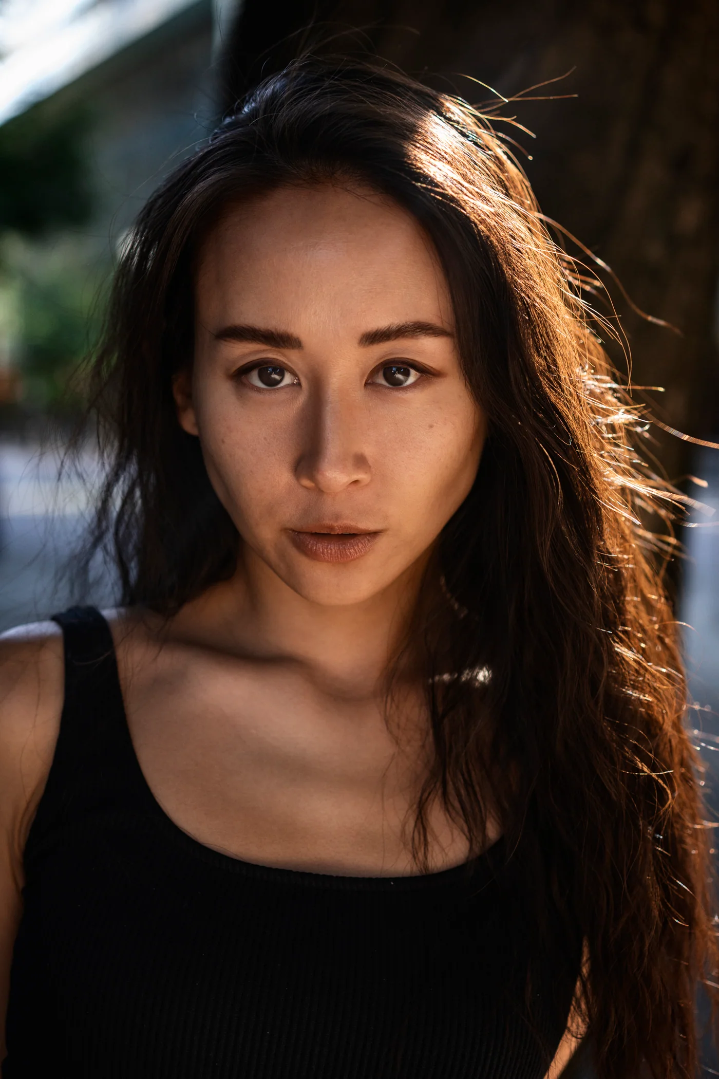 Natural-light Vancouver actor headshot of Flora with warm backlight
