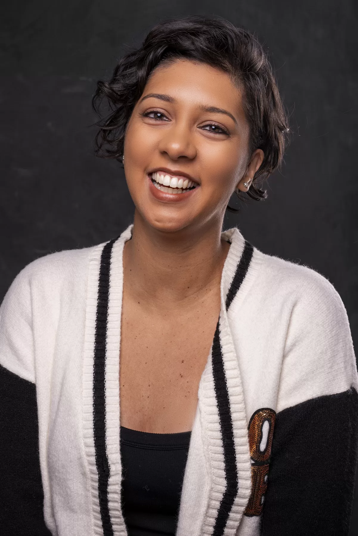 Smiling Vancouver actor headshot of Makailla Palliyaguru