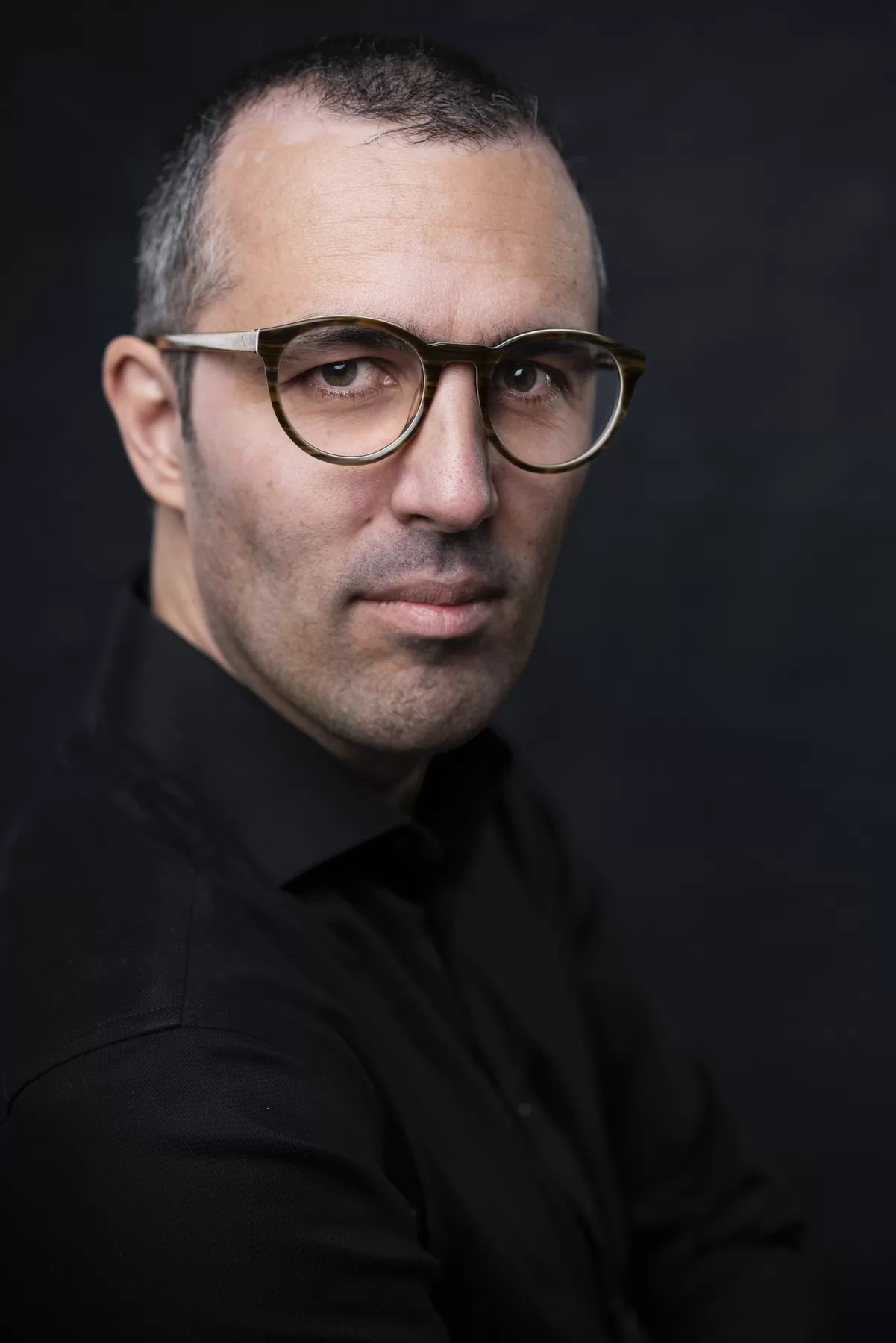 Dramatic Vancouver actor headshot of Sam K