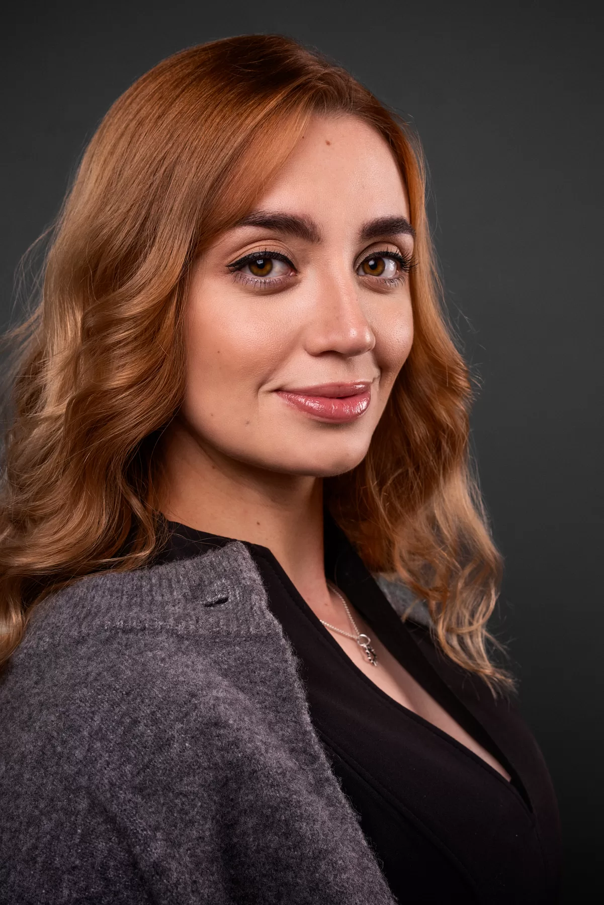 Natural actor headshot of a red-haired woman photographed by Hampus Danielsson in Vancouver